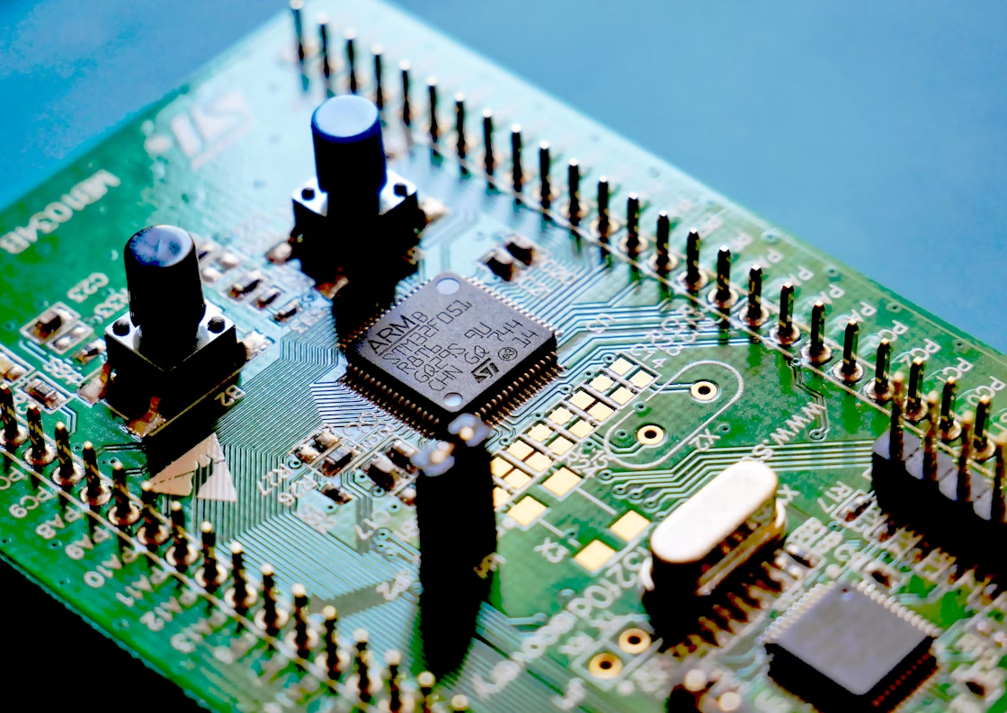 Close-up of an ARM-based microcontroller board, illustrating embedded systems used in everyday devices.