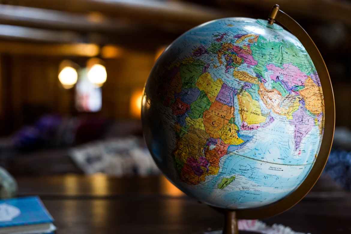 Close-up of a vintage world globe showing Africa, Europe, and the Middle East, highlighting map projection.